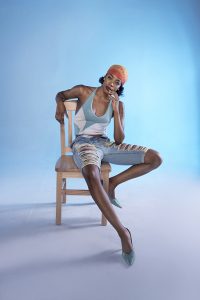 african american fashion photographer captures model in portfolio shoot